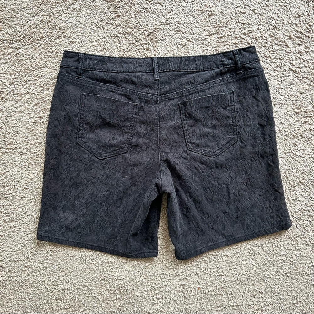 Black denim shorts with a unique pattern